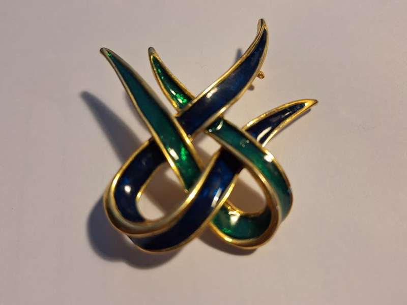 Blue and green enameled brooch