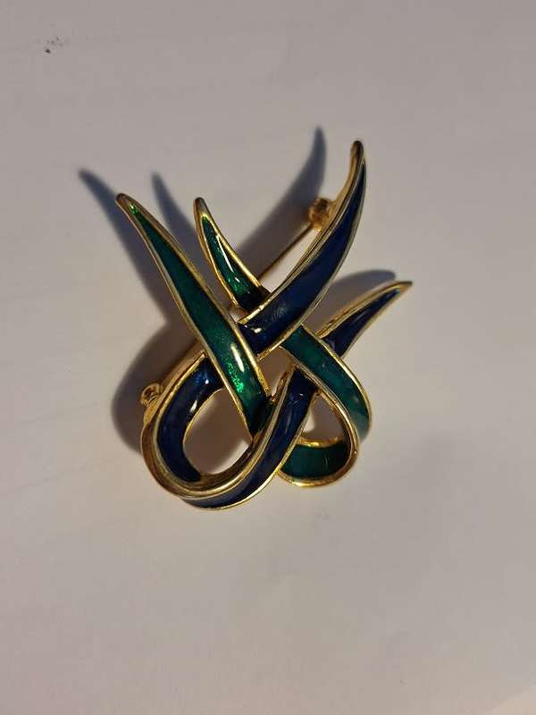 Blue and green enameled brooch