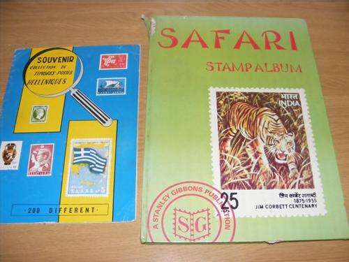 2 STAMP ALBUMS WITH STAMPS FROM ALL OVER