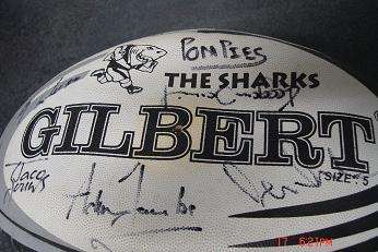 SHARKS RUGBY BALL SIGNED BY TEAM MEMBERS I DO NOT KNOW WHICH YEARS TEAM PLEASE SEE PHOTOS