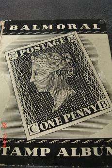 ALBUM WITH OVER 500 STAMPS