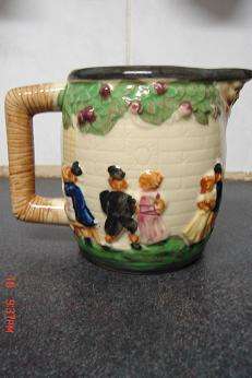LOVELY JUG IN RAISED DESIGN TO ADD TO YOUR COLLECTION