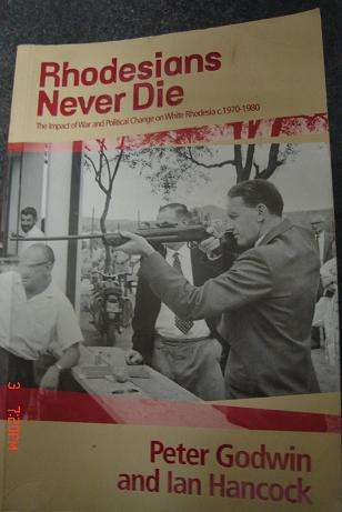 RHODESIANS NEVER DIE BY PETER GODWIN AND IAN HANCOCK