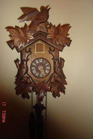 LOVELY CUCKOO CLOCK MADE IN WEST GERMANY WORKING BUT NEEDS SOME LUBRICATION