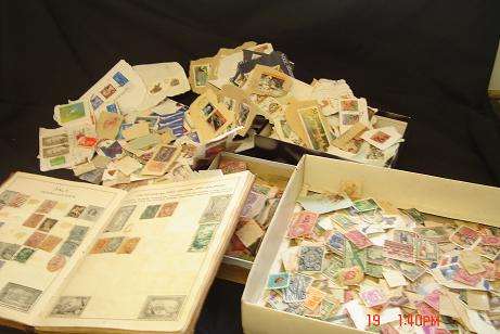 LOTS OF STAMPS PLUS AN ALBUM, SOME VERY OLD ONES RHODESIA, NATAL ETC.