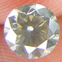 DIAMOND-Certified 0.69 Ct Natural Fancy Brown SI1 Round Brilliant Diamond 5.41x5.46
