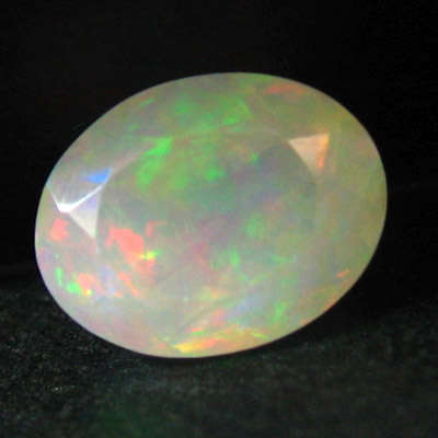 OPAL - 1.38Ct FANTASTIC! Bright Flashing & Color Play Faceted ETHIOPIAN Welo Opal