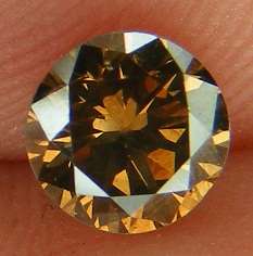 DIAMOND - STUNNING CERTIFIED 0.67 CT FANCY VIVID DARK BROWN VS2 ROUND BRILLIANT LOOSE DIAMOND 5.36