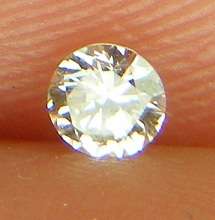 DIAMOND  - 0.10 CARAT LIGHT BROWN, VS2  ROUND BRILLIANT DIAMOND 2.97 x1.81mm
