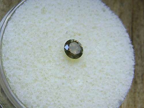 Fancy Olive Greenish Brown Round Diamond 0.21 ct.