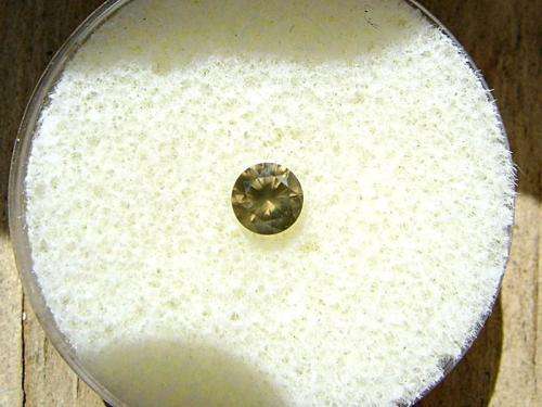 Fancy Olive Greenish Brown Round Diamond 0.21 ct.