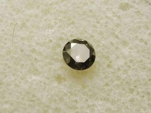 Fancy Brownish Grey Round Diamond 0.22 ct.