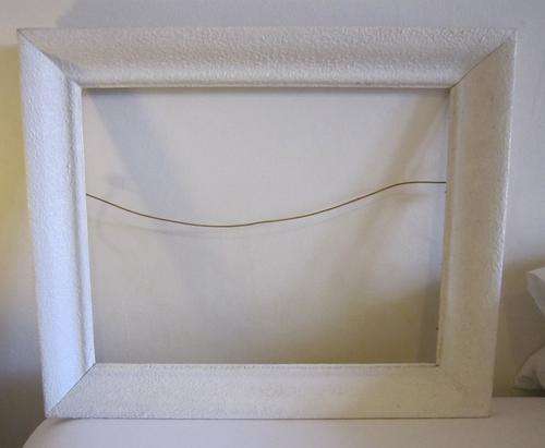 Old frame painted white