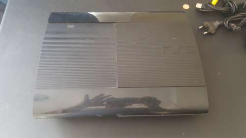 500G PlayStation 3 Slim Console + two Controllers + 3 games