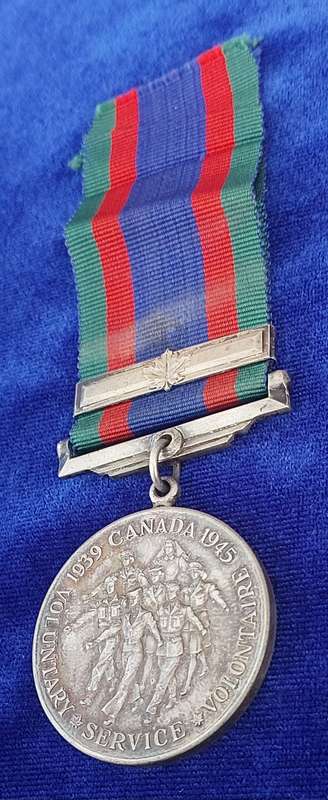 - Canadian Volunteer Service medal with Maple Leaf Clasp -