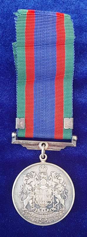 - Canadian Volunteer Service medal with Maple Leaf Clasp -