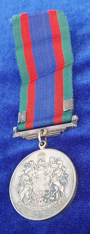 - Canadian Volunteer Service medal with Maple Leaf Clasp -