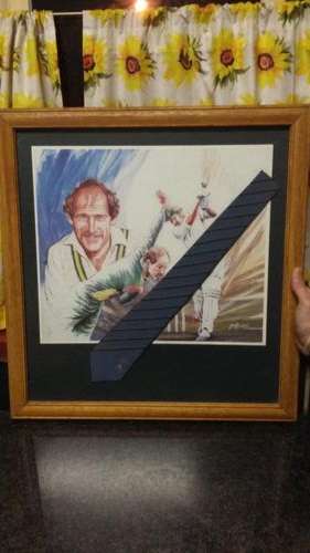 A beautiful Signed painting of Clive Rice with his tie!