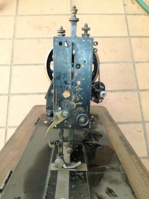 Antique sewing machine with box