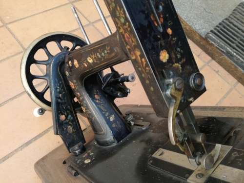 Antique sewing machine with box