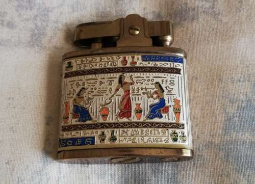 Assortment of tobacciana - lighters, cigarette holders and cigarette case