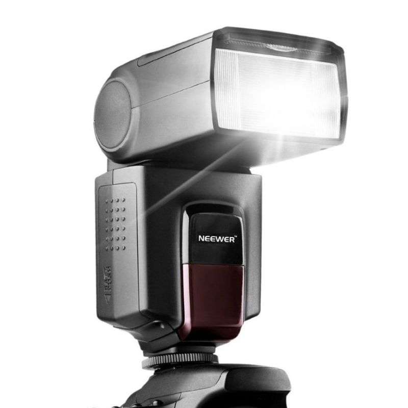 .Neewer TT560 Flash Speedlite For Canon or Nikon Digital SLR Cameras