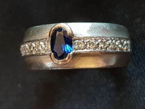 9ct white gold and diamond ring with sapphire