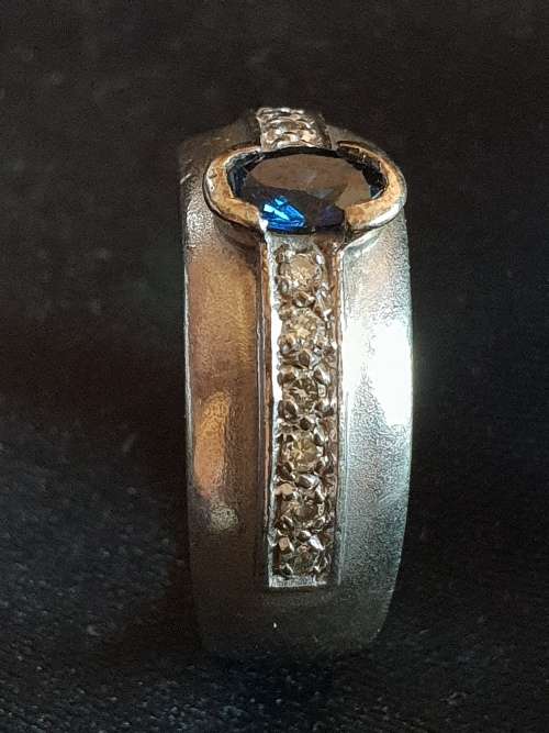 9ct white gold and diamond ring with sapphire
