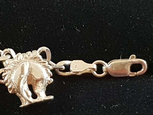 Unusual silver bracelet with the back end of the big 5 animals