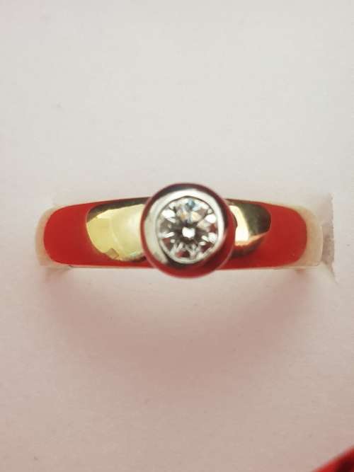 18ct yellow and white gold tube set  solitaire 0.34 carat diamond ring