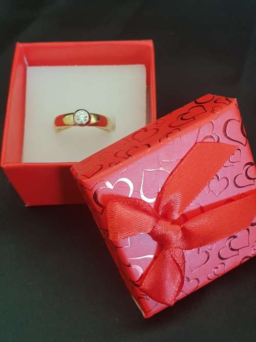 18ct yellow and white gold tube set  solitaire 0.34 carat diamond ring