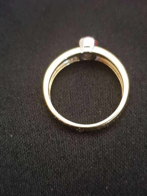 18ct yellow and white gold tube set  solitaire 0.34 carat diamond ring