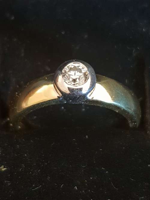18ct yellow and white gold tube set  solitaire 0.34 carat diamond ring