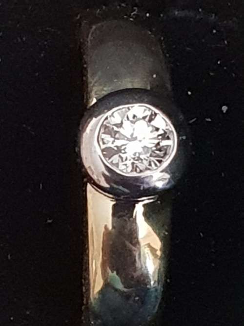 18ct yellow and white gold tube set  solitaire 0.34 carat diamond ring
