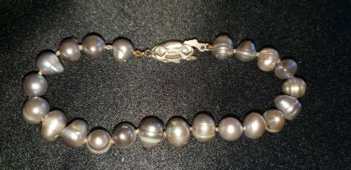 Genuine Fresh water black pearl bracelet with a Sterling silver clasp