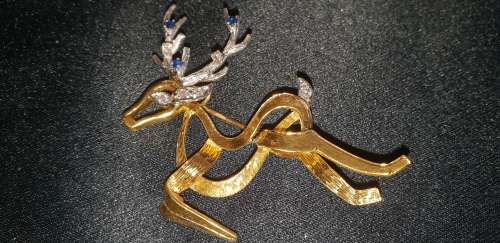 Stunning reindeer brooch 18ct gold and Diamonds and Sapphires