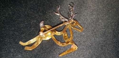 Stunning reindeer brooch 18ct gold and Diamonds and Sapphires