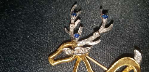 Stunning reindeer brooch 18ct gold and Diamonds and Sapphires