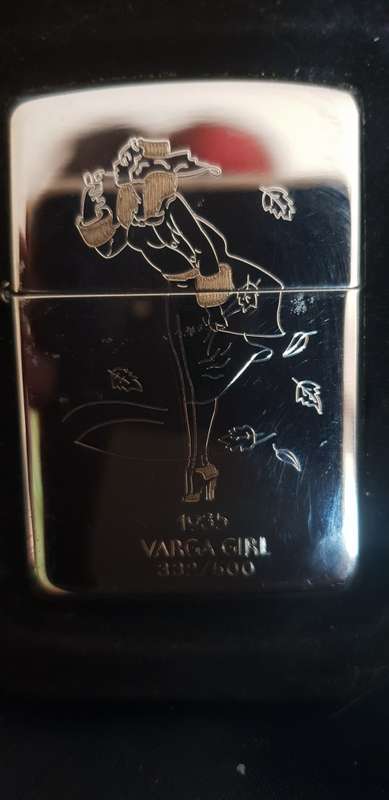Highly Collectable and Rare Silver Plated 1935 Varga girl Zippo lighter 332/500