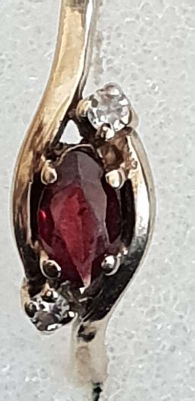 Genuine 9ct gold and garnet and genuine diamond ring