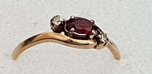 Genuine 9ct gold and garnet and genuine diamond ring
