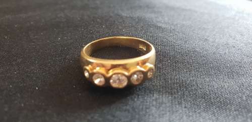 Genuine 18ct gold and five genuine natural diamond Dress ring