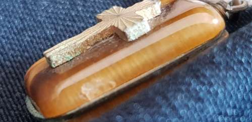 Cross pendant on Tigers eye
