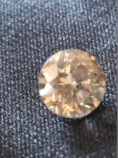 Round Brilliant cut Very large 1.237 carat I2 Yellowish brown Diamond