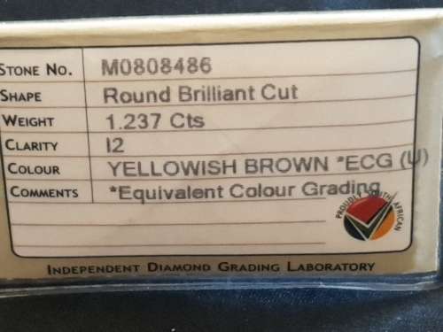 Round Brilliant cut Very large 1.237 carat I2 Yellowish brown Diamond