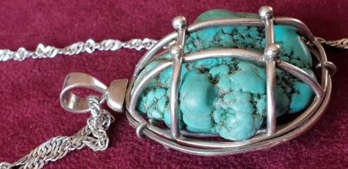 Rough Natural Raw Turquoise in Sterling silver hand made cage