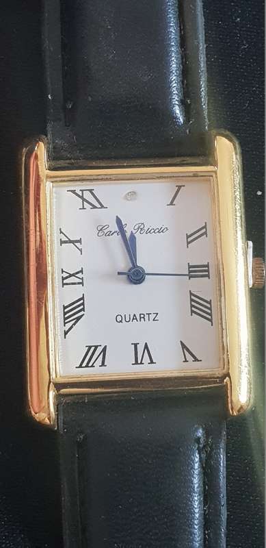 Gents watch with black leather strap