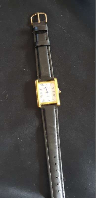 Gents watch with black leather strap