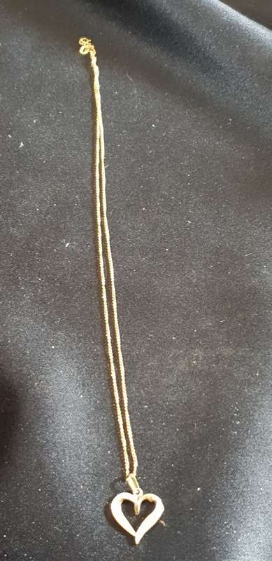 9CT Gold Necklace with a real diamond heart pendant