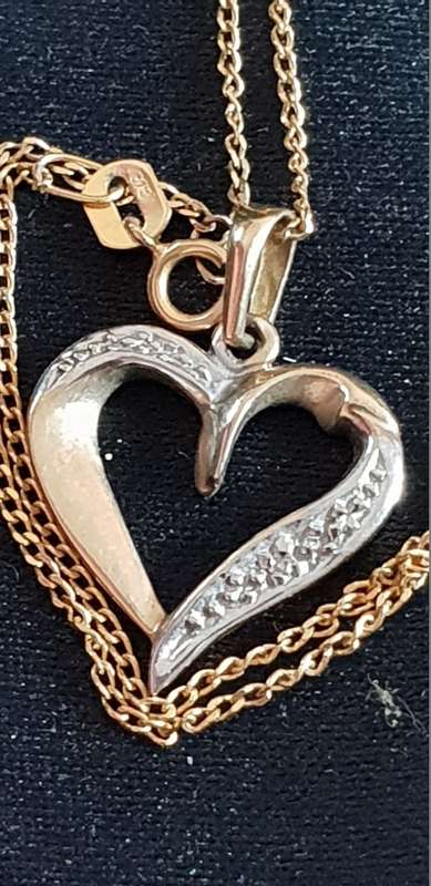 9CT Gold Necklace with a real diamond heart pendant